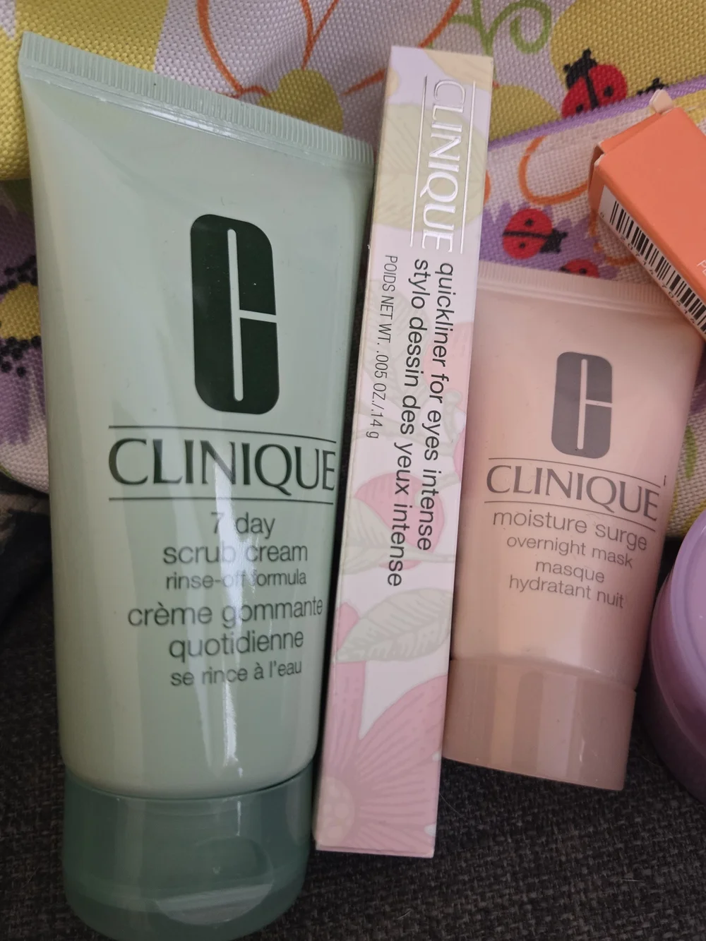 8 Piece Clinique Collection with 2 Purple Floral Pouches, Skincare, Makeup, Etc.